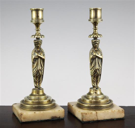 A pair of French Empire style figural bronze candlesticks, 8.25in.